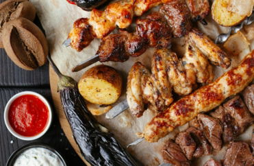 grilled meat and vegetable on the table